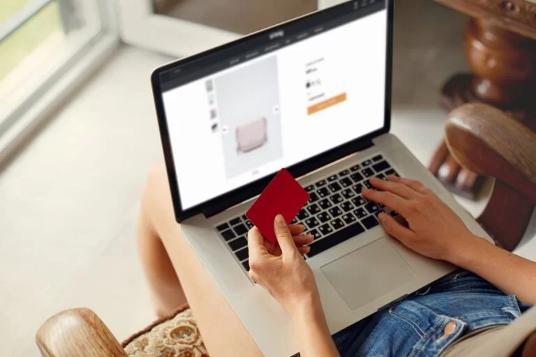 woman is holding credit card using laptop computer concept shopping online technology working from home min 768x512 20230908025327 csaoe 1